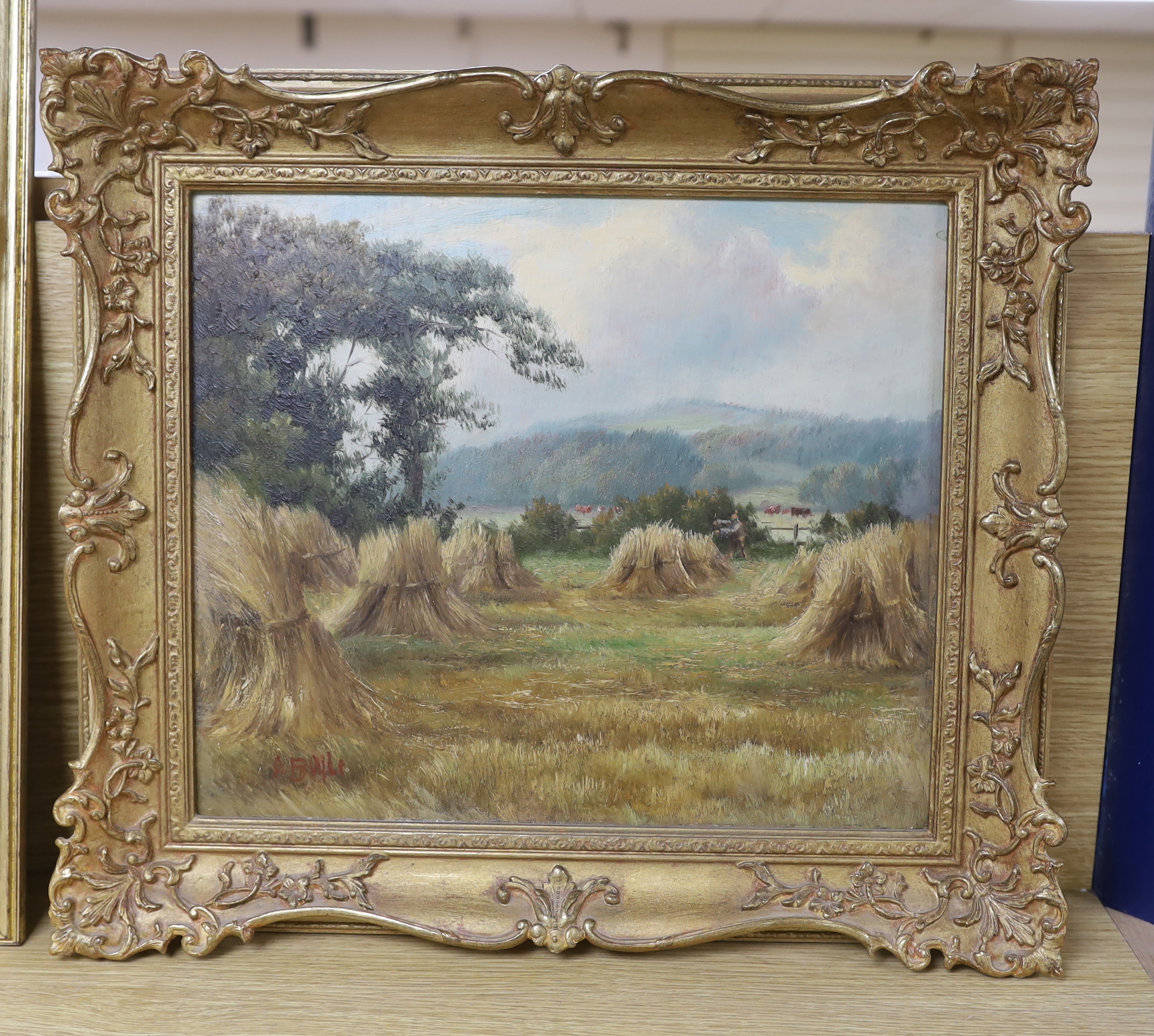 A Boule, oil on board, Landscape with hayricks, signed, 29 x 34cm, ornate gilt framed